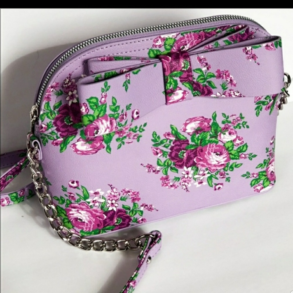 Betsey Johnson lavendar cross body purse.
